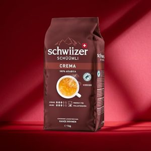 Schwiizer Schüümli Crema, 100 Prozent Arabica Kaffeebohnen, aromatisch-intensiv, für Vollautomaten, Stärke 3/5, mittlere Röstung, Rainforest Alliance-zertifiziert, 1kg